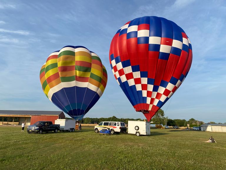 Hot air balloons on the ground at Bucks Airport
